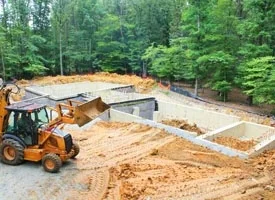 Зворотне засипання і ущільнення грунту Зворотне засипання і ущільнення грунту фото